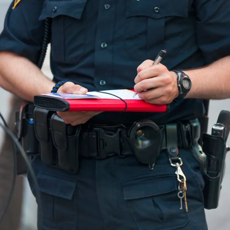 Police Officer Taking Notes